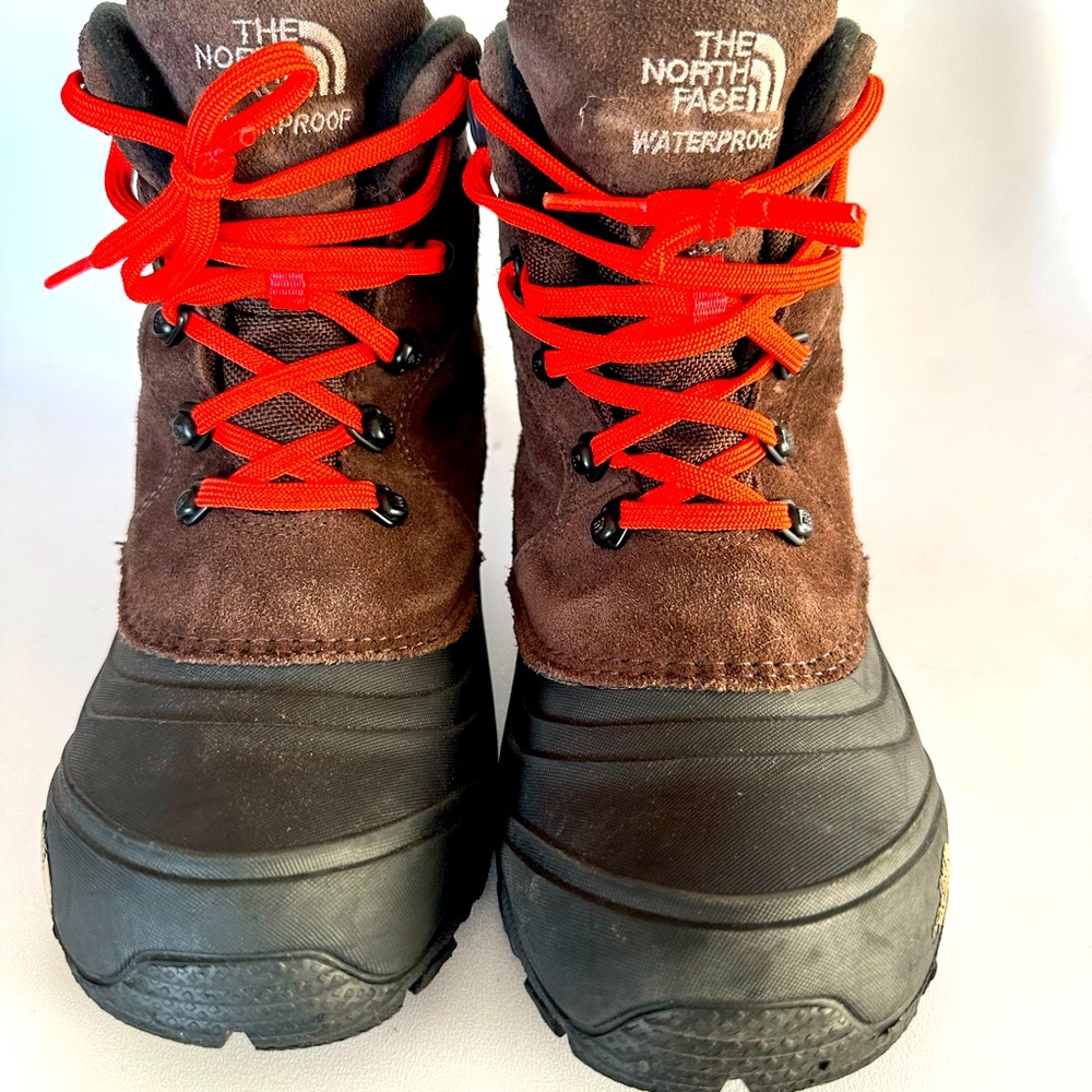 Children The North Face snow boots.